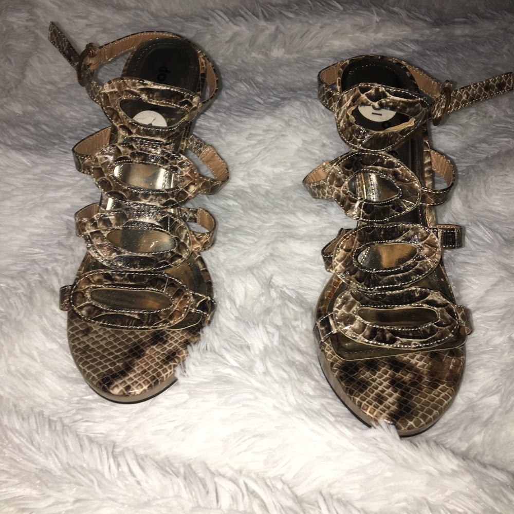 Snake skin high heeled shoes